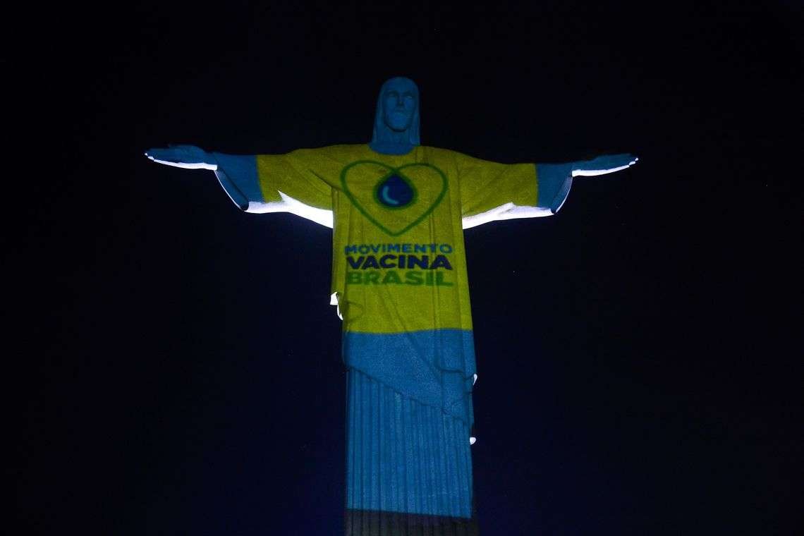 Cristo Redentor é iluminado para campanha do Movimento Vacina Brasil. (Fernando Frazão/Agência Brasil)