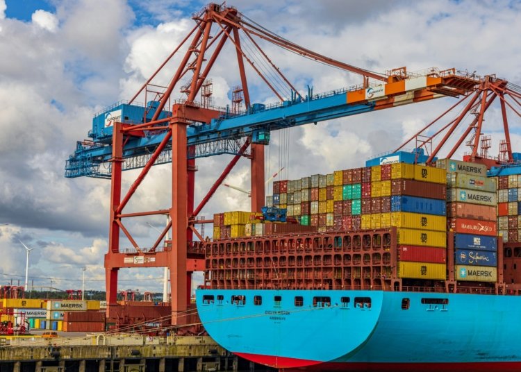blue and red cargo ship