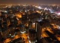 an aerial photography of city buildings at night