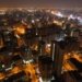 an aerial photography of city buildings at night