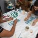 Retalhos de tecidos compõem tapetes inéditos na celebração de corpus christi no cristo