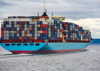 blue and red cargo ship on sea during daytime