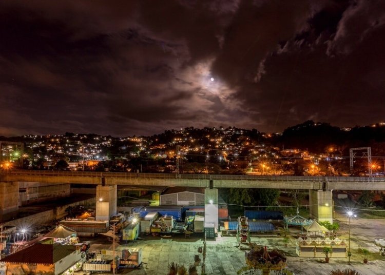 city with high rise buildings during night time