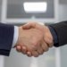 Close-up of a business handshake representing a successful partnership or agreement.