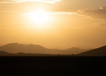 silhouette of mountains during sunset
