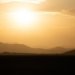 silhouette of mountains during sunset