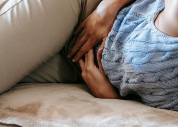 woman suffering from a stomach pain
