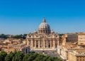 Aerial view of St. Peter's Basilica in Rome, Italy, with its iconic dome and surrounding architecture.