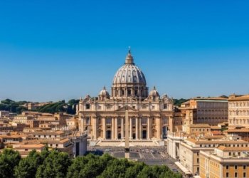 Aerial view of St. Peter's Basilica in Rome, Italy, with its iconic dome and surrounding architecture.